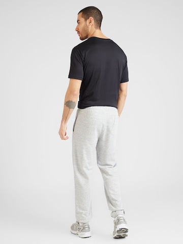 Champion Authentic Athletic Apparel Tapered Hose in Grau