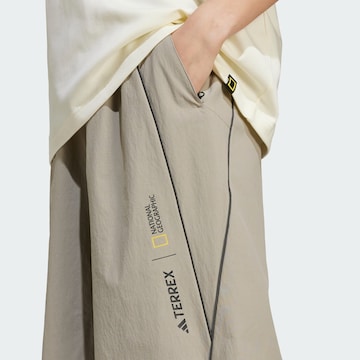 ADIDAS TERREX Wide leg Outdoor trousers 'Adidas x National Geographic' in Beige