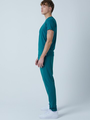 Coupe slim Pantalon de sport 'Slim Training Pants' SPORTKIND en vert