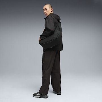 PUMA Regular Sporthose in Schwarz