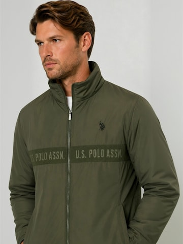 U.S. POLO ASSN. Välikausitakki ' UMJustin ' värissä vihreä