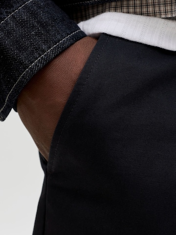 Baggy Pantaloni con piega frontale di JACK & JONES in nero