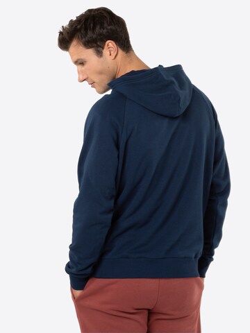 UNDER ARMOUR Regular Fit Sportsweatshirt 'Rival' in Blau