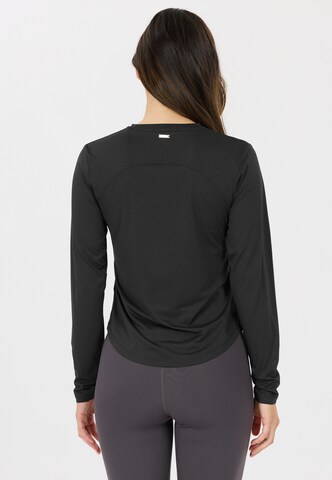 Athlecia Langarmshirt Doja in Schwarz