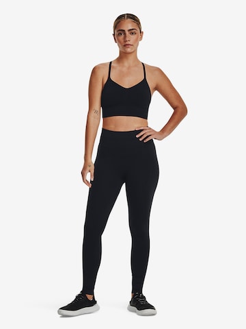 Skinny Pantalon de sport ' Train Seamless ' UNDER ARMOUR en noir