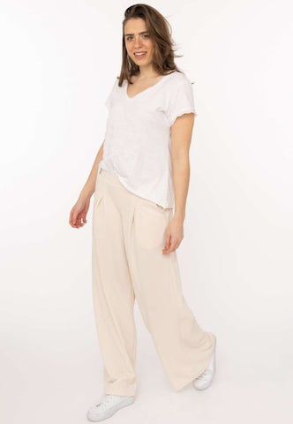 Zwillingsherz Loose fit Pleat-Front Pants in Beige: front