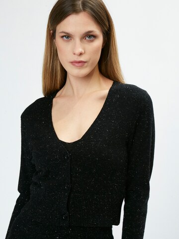 Influencer Strickjacke in Schwarz