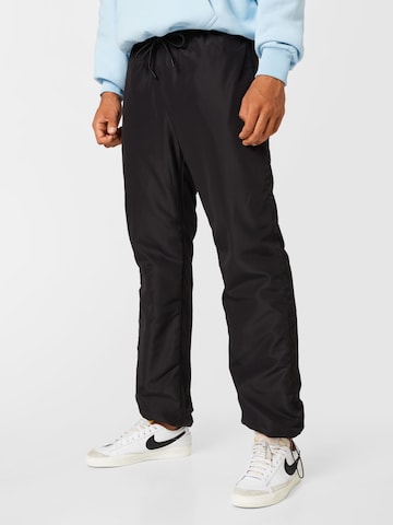 Urban Classics Tapered Pants in Black: front