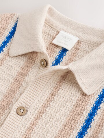 Next - Mono en beige