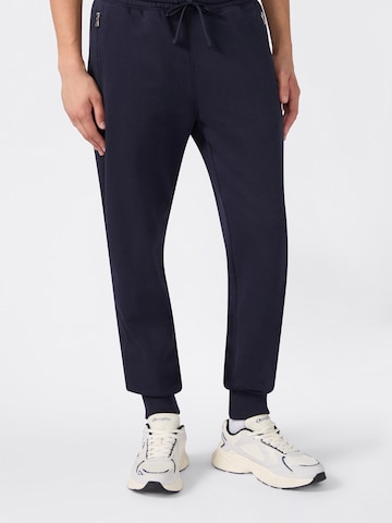 Champion Authentic Athletic Apparel Tapered Byxa i blå: framsida
