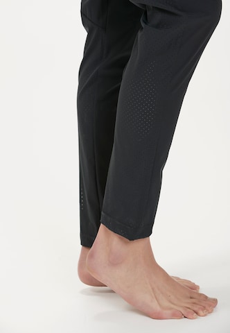 Athlecia Regular Workout Pants 'GOLINA W' in Black