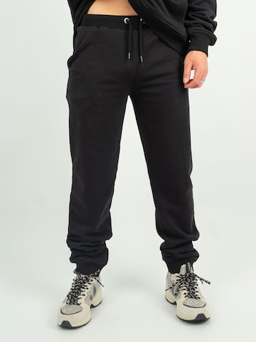 NOORLYS Regular Workout Pants 'MOMME' in Black: front