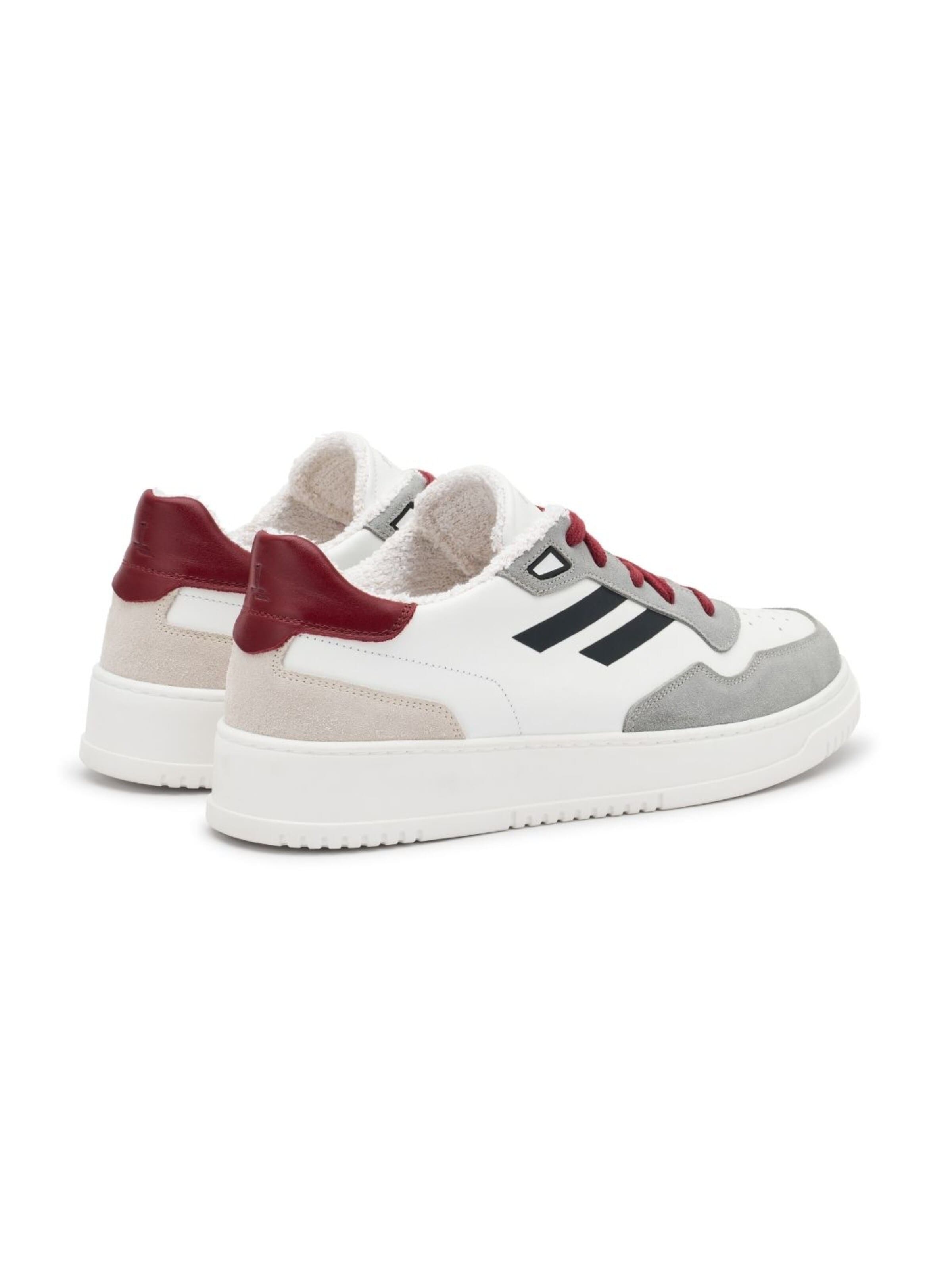 Sneaker bassa 'Bianco Brillante' di PR1MO in rosso