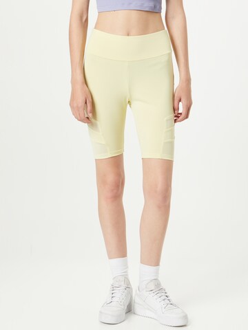 Urban Classics Skinny Leggings in Yellow: front