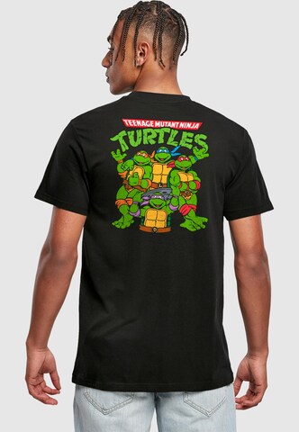 Merchcode T-Shirt 'Turtles Team' in Schwarz: Vorderseite