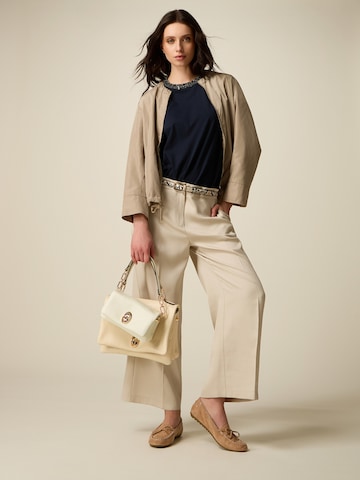 oltre Baggy Pants in Beige: front