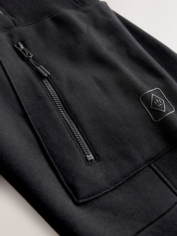 Next Дънки Tapered Leg Панталон в черно