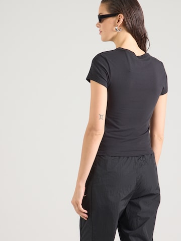 Nike Sportswear - Camisa 'Chill Knit' em preto