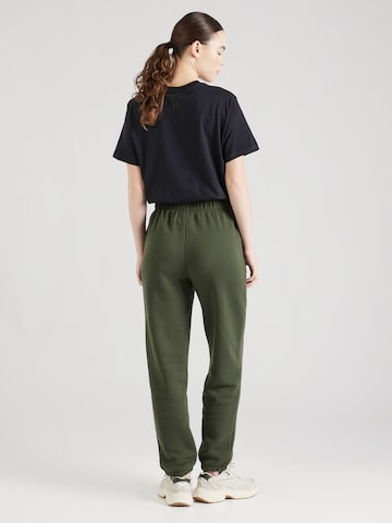 regular Pantaloni 'Heritage' di new balance in verde