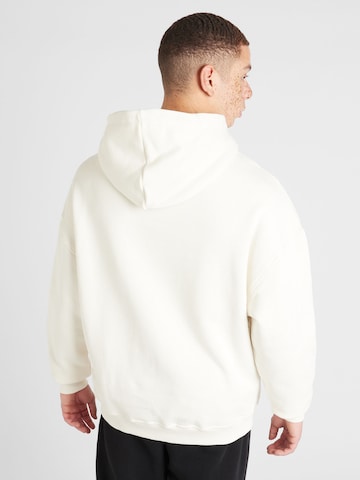 Sweat-shirt Pequs en blanc