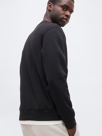 Champion - Sudadera en negro