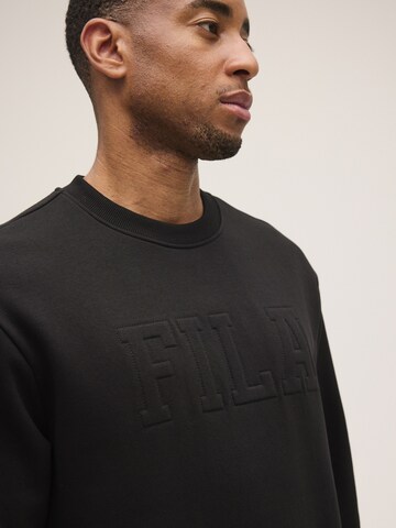 FILA Sweatshirt 'COREDO relaxed varsity brushed sweatshirt' in Zwart