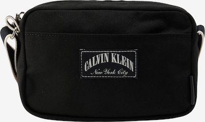 Rankinė su ilgu dirželiu iš Calvin Klein, spalva – juoda / balta, Prekių apžvalga