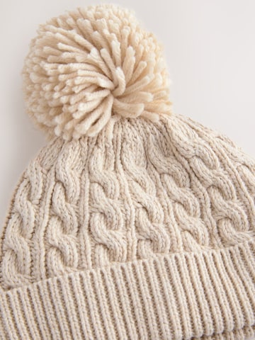 Bonnet Next en beige