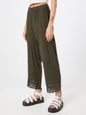 ABOUT YOU Loose fit Trousers 'Carlene' in Green: front