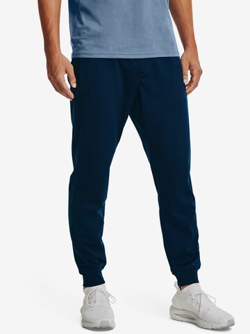 Effilé Pantalon de sport UNDER ARMOUR en bleu : devant