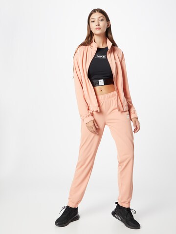 Nike Sportswear - Chándal 'Essential' en naranja