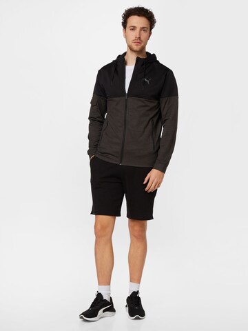 PUMA Sportjacke in Schwarz