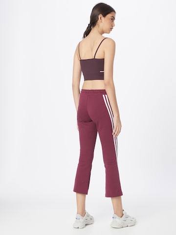 ADIDAS PERFORMANCE - Acampanado Pantalón deportivo en rosa