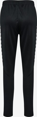 Hummel - Tapered Pantalón deportivo en negro