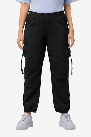 Ulla Popken Tapered Cargo Pants in Black: front