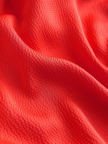 Robe Next en orange