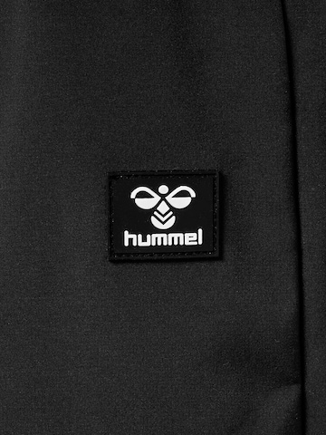 Effilé Pantalon d'extérieur 'Jupitor' Hummel en noir