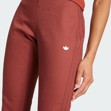 ADIDAS ORIGINALS Flared Trousers 'Premium Essentials' in Brown