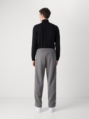Loosefit Pantalon 'Dishorte' HUGO en gris