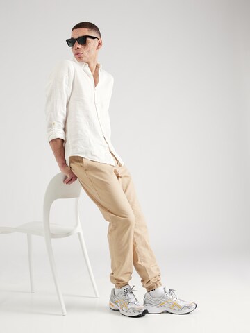 SCOTCH & SODA - Tapered Calças 'Seasonal' em castanho