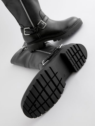 Boots Next en noir