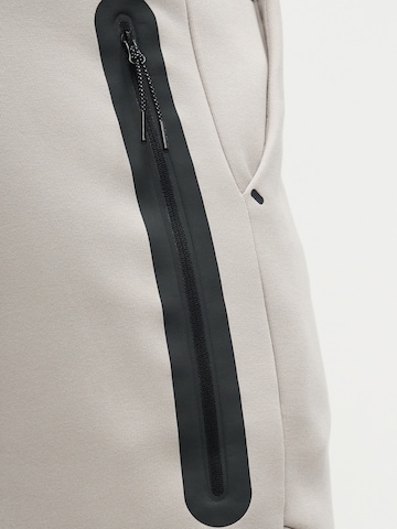 Nike Sportswear Tapered Trousers 'TCH FLC' in Grey