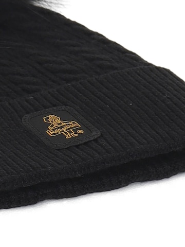 Refrigiwear Mütze 'Pompom junior' in Schwarz