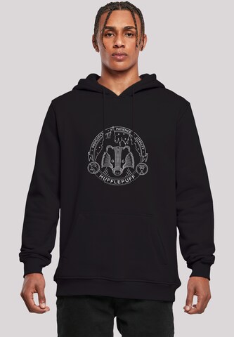 F4NT4STIC Sweatshirt 'Harry Potter Hufflepuff Seal' in Black: front
