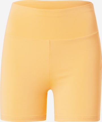 Urban Classics Curvy Skinny Leggings in Orange: front