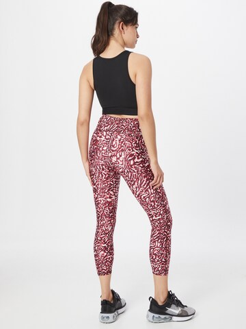 Skinny Pantalon de sport UNDER ARMOUR en rouge