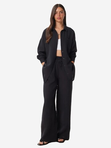 Completo pantalone di Happiness İstanbul in nero: frontale