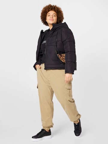 Effilé Pantalon cargo Urban Classics en beige