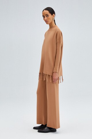 Touche Prive Kostuum in Beige