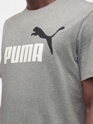 PUMATehnička sportska majica 'ESS No. 1' - siva boja